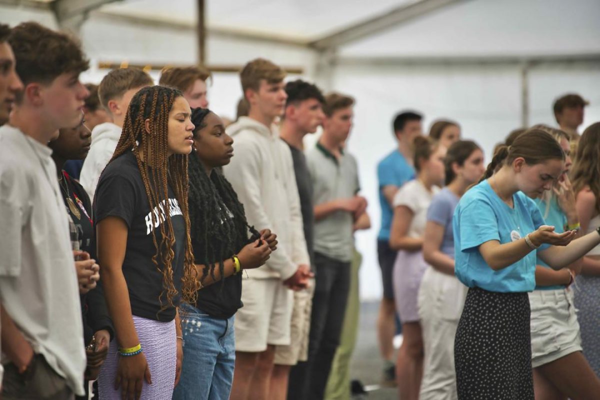 Young people worshipping