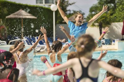 Pool animatrice with kids action shot